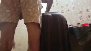 Indian StepMom got help by stepson while working in kitchen - 2 image
