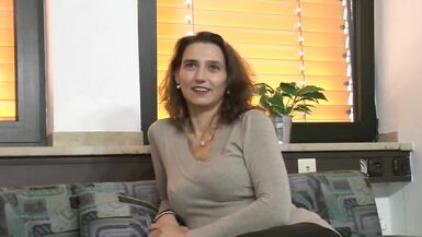 Happy and smiling sexy brunette german milf gets up and dildoes her pussy while she strokes her small tits - 2 image