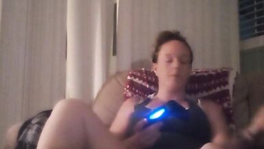 Milf Smoking Cigarettes Playing Video Games In Mini Dress - 2 image