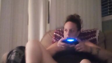 Milf Smoking Cigarettes Playing Video Games In Mini Dress - 7 image