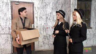Two blonde milf police officers arrest a guy and take him to the back alley for a threesome - 1 image