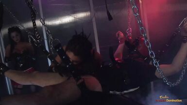 Busty brunette slut teaching a chained dude a lesson with - 1 image