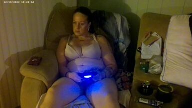 Busty Long Hair Brunette In Bra and Panties Playing PlayStation - 1 image