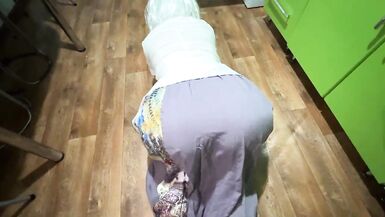 Stepmom is standing in the kitchen and wants anal sex for her mature and big ass