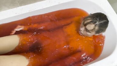 A baths in red coloured Jelly Cubes - 11 image