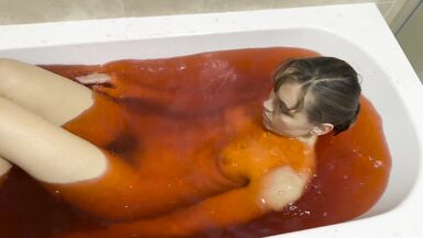 A baths in red coloured Jelly Cubes - 13 image