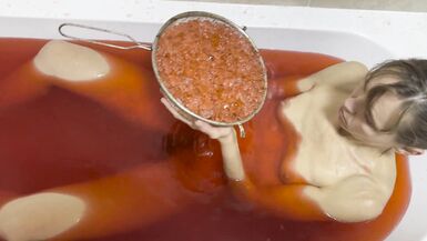 A baths in red coloured Jelly Cubes - 14 image