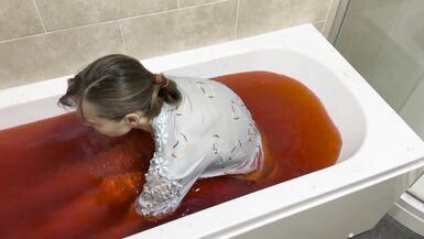 A baths in red coloured Jelly Cubes - 2 image