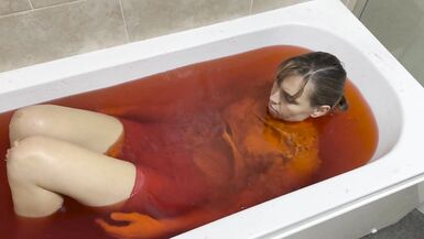 A baths in red coloured Jelly Cubes - 3 image