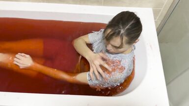 A baths in red coloured Jelly Cubes - 5 image