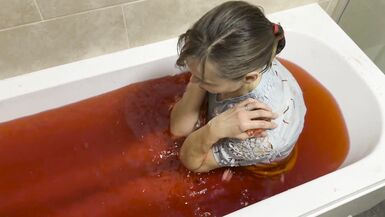 A baths in red coloured Jelly Cubes - 7 image