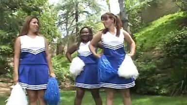 Obese dark brown cheerleader rides thick cock outside