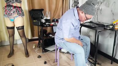 A undressed maid is cleaning up in an silly IT engineer's office. Real camera in office. two - 3 image