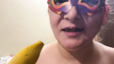 Ellie masturbates with a banana - 7 image