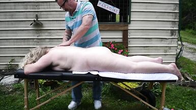 Short clip of an outdoor massage session - 3 image