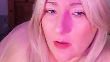 Kate the Hotwife and a blue and pink dildo - 1 image