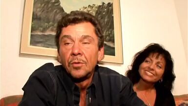 German milf fucking with one cock in her pussy and one in her throat during the threesome - 1 image