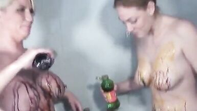 Horny chicks cover each other's naked bodies with paint in the shower - 14 image