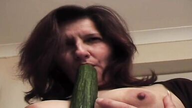 Submissive gilf Julie Whitaker fucks huge cucumber (part 2 of 2) - 6 image