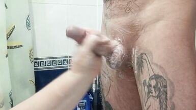 bitch jerks off my dick in the bathroom until I cum - 12 image