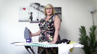Horny stepmom in stockings ironing her panties, takes a break and fingers her wet pussy - 2 image