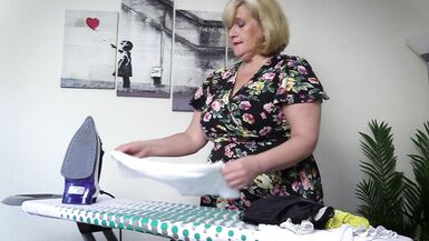 Horny stepmom in stockings ironing her panties, takes a break and fingers her wet pussy - 3 image