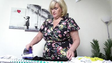 Horny stepmom in stockings ironing her panties, takes a break and fingers her wet pussy - 6 image