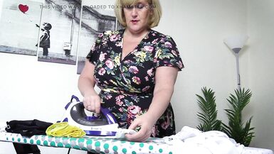 Horny stepmom in stockings ironing her panties, takes a break and fingers her wet pussy - 9 image