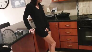 Slut in high heels, smoking, pissing in her panties. - 2 image