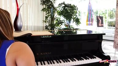After playing some music, this brunette begs her lesbian piano teacher to fuck her raw - 1 image