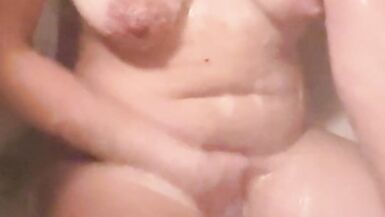 Mommy have a bath and play with her amazing tits and nipples. - 8 image