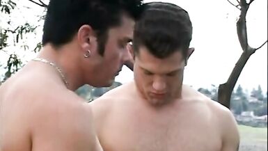 Sexy slut gags on two thick white cocks outside then gets fucked - 2 image