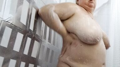 Naked stepmom with big tits and ass takes a shower - 10 image