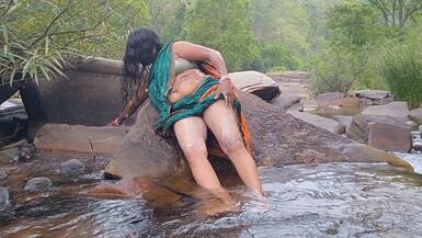 Telugu sexy Silk aunty outdoor waterfall bathing, telugu Dirty talks. - 1 image