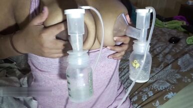 Milf Big lactating tits get breast pumped and milked - 14 image