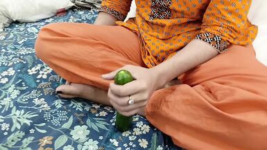 Pakistani Housewife Inserting Large Cucumber in Her Tight Pussy - 1 image