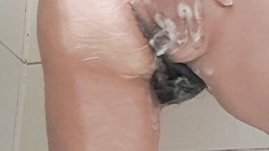 Mature milf bathing her tits and hairy pussy gets excited by the water - 5 image