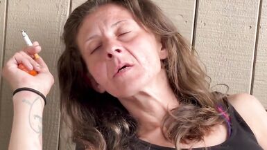 Everyone's Favorite Aunty Caught Smoking and Playing with Her Pussy on the Porch.