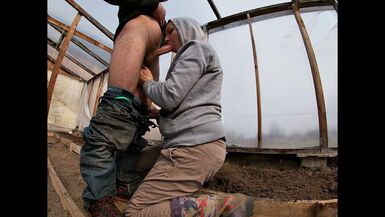Farmer's Wife with Rubber Boots Sucks a Cock in the Greenhouse - 1 image