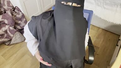 A Turkish woman with beautiful eyes in a hijab masturbates in pantyhose - 1 image