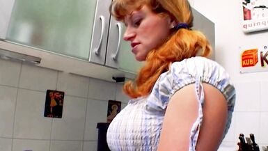 A curvy German babe gets her asshole smashed in the kitchen