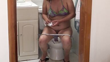 Watching stepmom pissing on the beach and in the house while I masturbate - 13 image