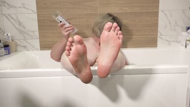 Do you want to wash my feet? Foot fetish from a mature milf in the bath. - 2 image