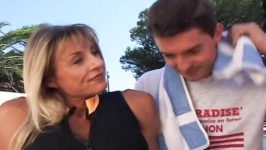 Big boobed Blonde French MILF enjoys outdoor threesome - 2 image