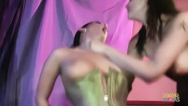 Enchanting threesome with two lesbians that ride a cock and fuck with a strapon. - 14 image
