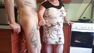 my mother-in-law saw my cock and began to milk it until I finished - 13 image