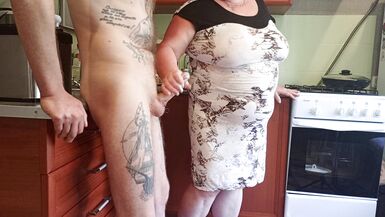 my mother-in-law saw my cock and began to milk it until I finished - 14 image