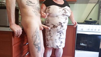 my mother-in-law saw my cock and began to milk it until I finished - 8 image