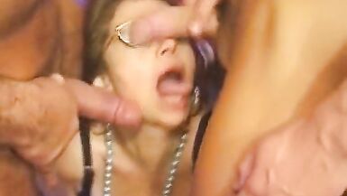 Busty and horny German lady gets her face sprayed by three loaded rods - 15 image