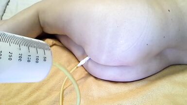 A large syringe of boiling milk enema - Royal moans - 4 image
